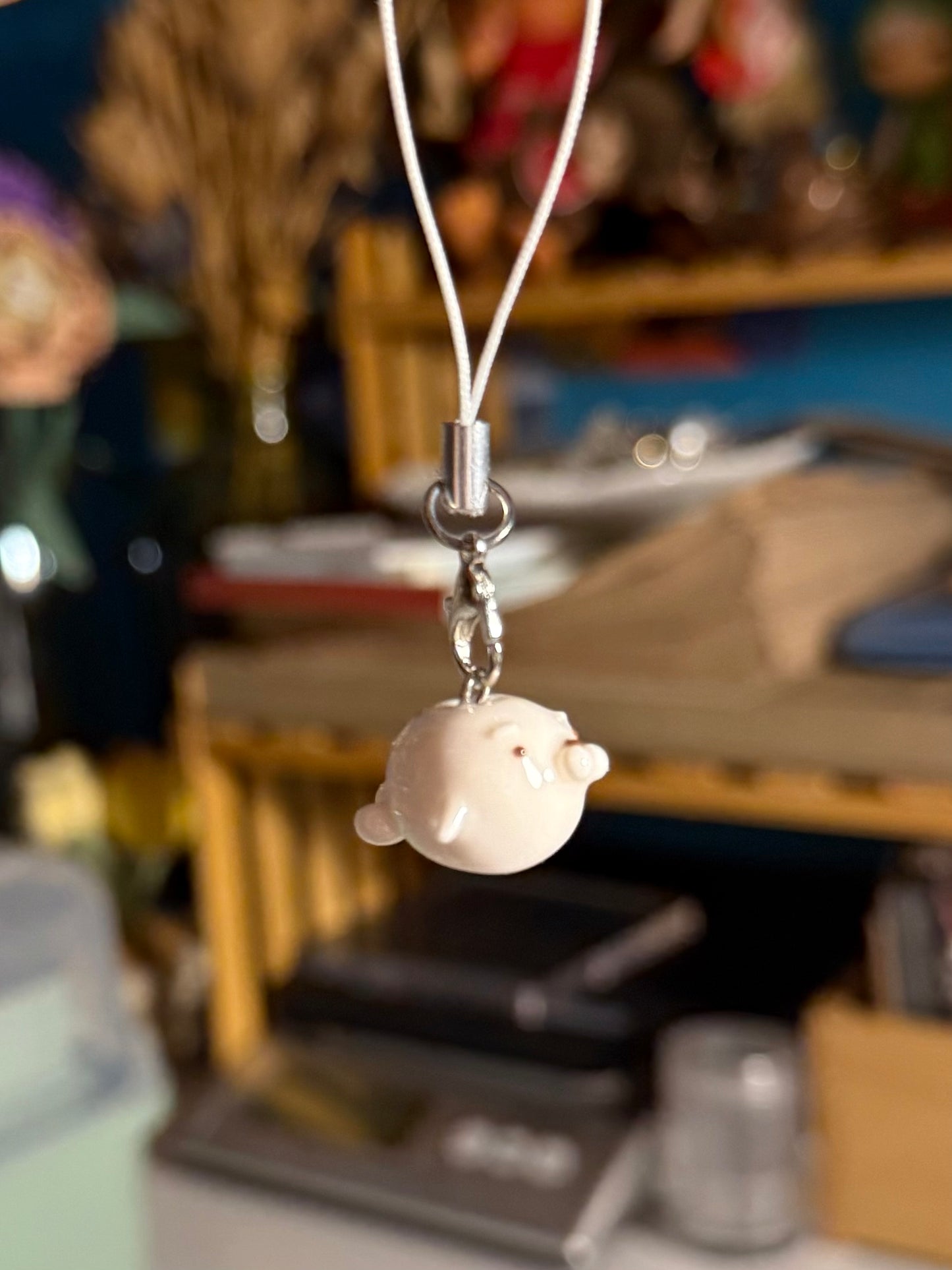 white seal phone charm