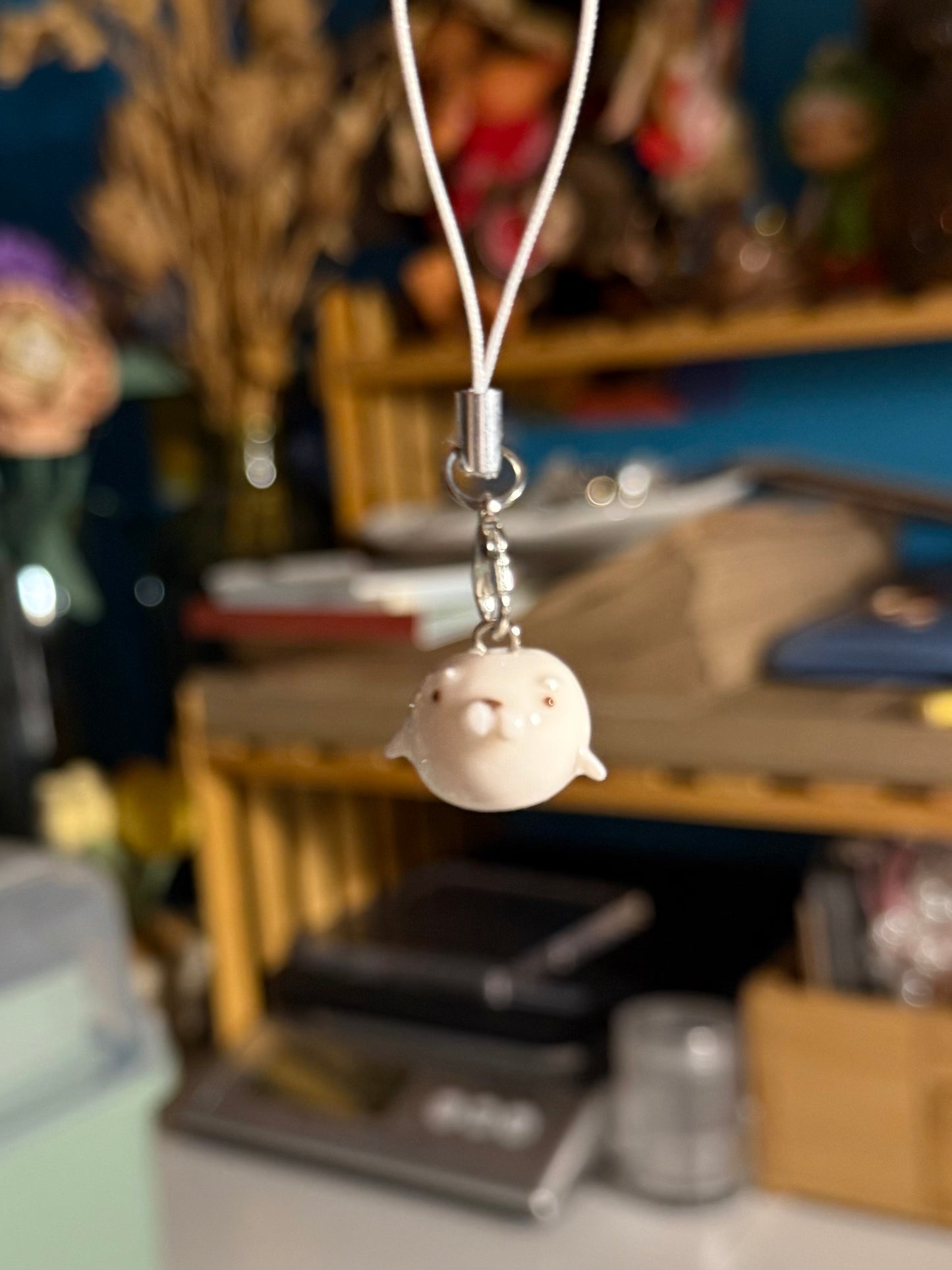 white seal phone charm