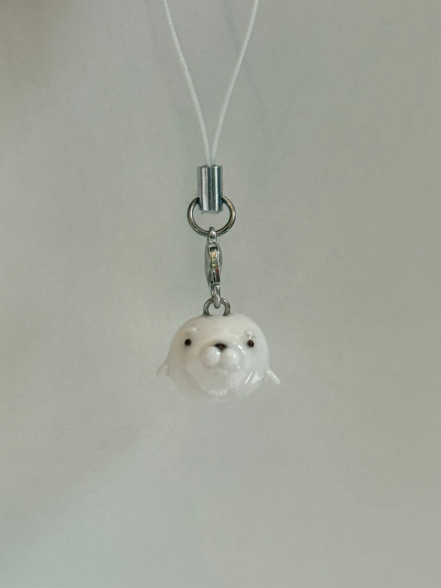 white seal phone charm
