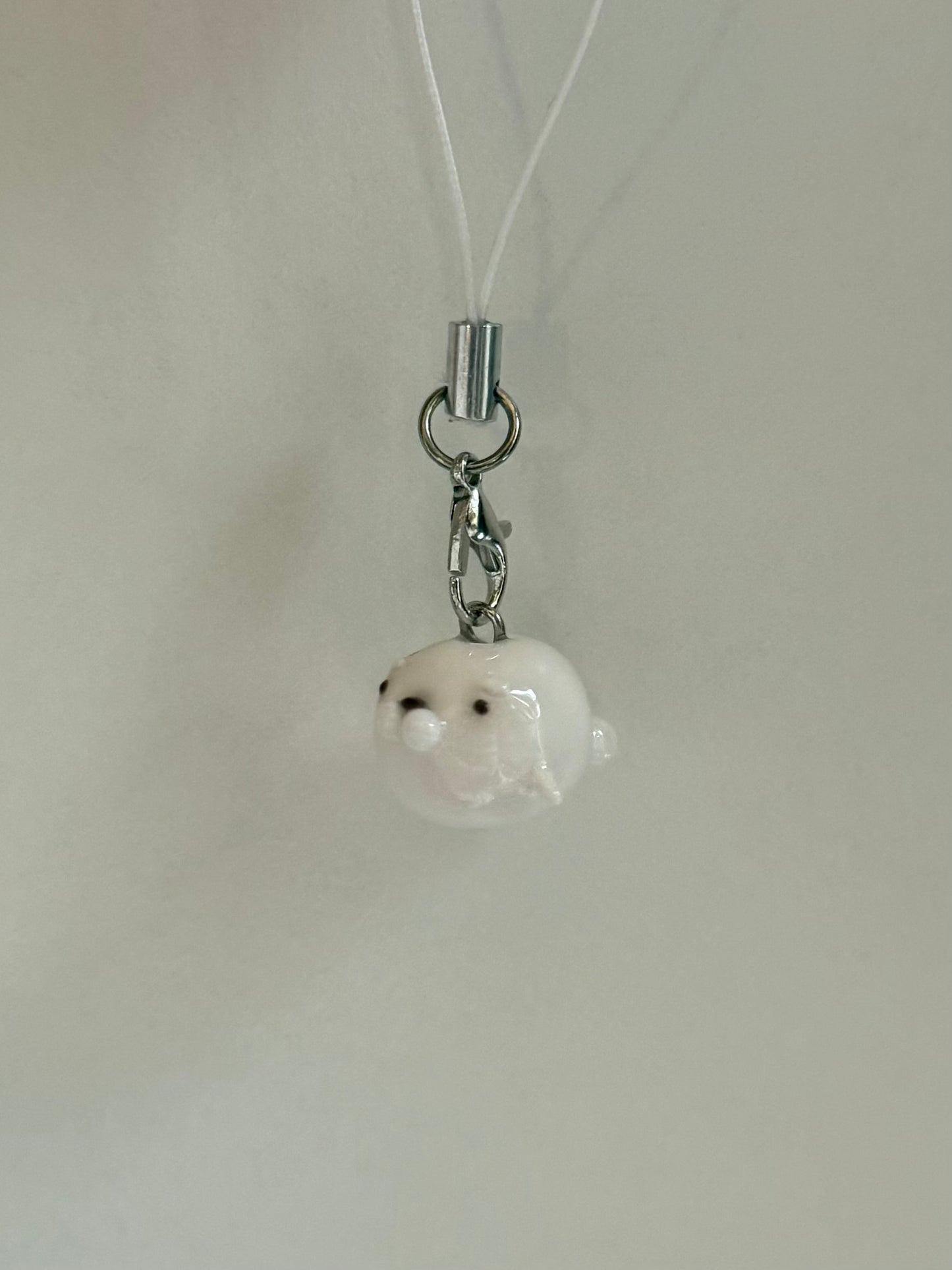 white seal phone charm